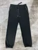 Pantalons pour hommes Designers Hommes Pantalons décontractés Pentagramme de diamant artificiel de haute qualité Hommes Femmes Survêtements Pantalon de mode Hip Hop 248n