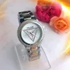 Triángulo de lujo Reloj clásico para mujer Diamantes Dial Anillo de bisel 34 mm Marca de moda Movimiento de cuarzo Reloj para mujer Reloj de pulsera resistente al agua de acero inoxidable