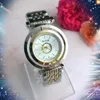 Relogio Masculine Ladies Watch Célèbre Poignet Mode Blanc Diamants Brillants Cadran Calendrier Bracelet Fermoir Pliant Horloge Cadeau De Luxe Montre-Bracelet De Haute Qualité