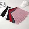 تنورات تنورة نسائية مطوية على الطراز الكوري امرأة الصيف 2022 أزياء الملابس الوردي مرنة عالية الخصر قصير أبيض صغير للبنات