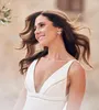 Designer Mermaid Wedding Dresses Backless Bridal Gowns Sleeveless Deep V Neck Plus Size Trumpet Sweep Train robe de mariee