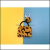 Ключевые кольца леопардовая сумочка Ключ Кольцо Симпатичная мини -кошелька для брелок для брелок плюшевые Keyrings Girls Fashion Пушистая шерсть на машине.