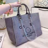 Bolsos clásicos de lujo Bolsos de noche Marca Lona bordada Paquetes de mujer Bolso de playa Moda Paquete femenino grande Mochila Bolso pequeño outlet de fábrica 70% de descuento en CPGU