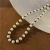 Choker Gsold Минималистский жемчужный ожерелье с разноцветными семенами.