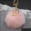 Keychains Pompom Key Chain Creative 8cm Novely Rabbit Päls Ball Keychains Söt pärla fluffiga nyckelringar för kvinnors flickor C132 Bdejewelry DH6ZT