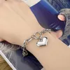 Link Pulseras multicapa Cadena de acero de acero Pulsera cruzada Cross Cross Pulsera para mujeres Corea Hip Hop Kiss Love Letter Bangle Jewelry