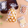 Geschenkverpackung Transparente OPP-Süßigkeitstüten Kleine Zellophan-Kekstüte Weiße Punkte Sternverpackungsbeutel Hochzeitsbevorzugungen für Gäste