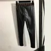 Pantalon en cuir chaud pour femme Pantalon en peluche à la mode noire Pantalon moulant chaud d'hiver