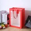 Sacs ￠ provisions 500pcs / lot Sac-cadeau transparent avec fen￪tre en carton rouge 250g Handle d'emballage de la f￪te des m￨res Bouquet Christmas Candy