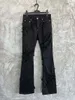 Neue Herren-Jeans mit ausgestelltem Bein und doppellagiger, ausgefranster Version im Designer-Stil