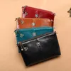 Bolsos de noche de cuero genuino Mini bolso de diseñador para mujer 2022 Girl Shopper Fashion Clover Tassel Little Daisy Decoration Clutch Crossbody