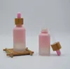 5-100ml Tüpler Pembe Damla Cam Şişeler Aromaterapi Sıvı Temel Masaj Yağ Pipeti Doldurulabilir Şişeler Bambu Kapağı