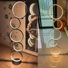フロアランプはシンプルなモダンな垂直サークルリビングルームクリエイティブパーソナリティベッドルーム雰囲気ランプを率いていました