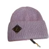 デザイナーウールニットビーニースカルキャップ冬の帽子ソフトレター男のためのシンプル5色2474485