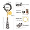 Bracciali portachiavi personalizzati in acciaio inossidabile senza filo per le donne Gioielli da indossare quotidianamente in strada Portachiavi in morbido silicone con perline