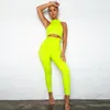 Pantaloni da donna a due pezzi Set di tute Shinny color neon Top e abbigliamento sportivo da donna per abiti da allenamento fitness abbinati