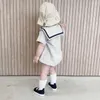 Rompers 2022夏の女の女の子の女の子のボディースーツコットンガールキュートネイビーカラージャンプスーツソリッドボーイワンシー幼児服