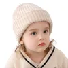 10色のベビーハットソフトウォームキッズビーニービーニーニット幼児用の帽子の編み帽子の固体ストライプ色の子供冬帽子卸売