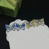 Nouveau papillon Designer boucles d'oreilles femmes personnalité charme goujons Double lettres gouttes pour la fête spectacle Date