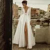 2022 Wedding Dresses A Line Formal Bridal Gowns Arabic Simple Sexy V Neck Illusion Boho Long Sleeves Satin Backless Beach Floor Length Plus Size Side Split Sashes