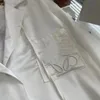 Camicia firmata versione top fatta a mano LOE 2022 autunno e inverno nuovo logo ricamato uomo donna con la stessa camicia streamer