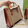 Sacs à bandoulière de concepteur en bambou de haute qualité fourre-tout en toile flammée chaîne de matériel de luxe pour femmes en cuir véritable Shopping bandoulière classiques pochette