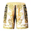 Shorts Masculino Dourado Luxo Estampado Praia Mens Calças de Designer Tamanho Grande 2022 Verão Roupas Incomuns Produtos Soltos Vestido de Festa Barroco