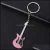 Keychains Creative Mini Musical Instrument Keychain Cute Sile Guitar Pianosaxophone Key Chain Backpack Car Ornament Musician Sieraden DHPRF