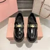 Üst elbise ayakkabıları lüks kabartmalı logo deri kayış somunları tütün siyah mius moda trend kadınlar yuvarlak kafa kalın alt ayakkabı Eur 34-40 kutu ile