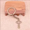 Key Rings 20Pcs New Fashion Keychain 38X22 Mm Hollow Cross Pendants Diy Men Jewelry Car Key Chain Ring Holder Souvenir For Gift Drop Dhxop
