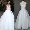 Bröllopsklänning 11531# Real Pos ärmlös Beading A-Line öppen rygg V-ringning Tulle spets applikationsklänning Bridal