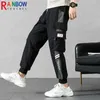 Pantalons pour hommes Rainbowtouches 2021 Nouveau sport en vrac Cravate-pied Casual Fitness Pantalon à neuf points Tendance de la mode pour hommes Vêtements Harem Cargo Pantalon T220909