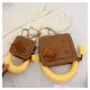 Kindermode handtassen 2022 Autumn Winter Biscuit Shape Girl Texture Lady Chain Crossbody Body Parent-Child One Shoulder Bags F1504