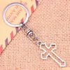 Key Rings 20Pcs New Fashion Keychain 38X22 Mm Hollow Cross Pendants Diy Men Jewelry Car Key Chain Ring Holder Souvenir For Gift Drop Dhxop