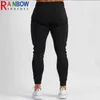 Calças masculinas RainbowTouches Autumn e Winter New Solid Color Sports Fitness Trouspers Training Running Men's Clothing Super Elastic Pants T220909