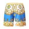 Shorts Masculino Dourado Luxo Estampado Praia Mens Calças de Designer Tamanho Grande 2022 Verão Roupas Incomuns Produtos Soltos Vestido de Festa Barroco