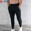 Pantalones de hombre Rainbowtouches 2022 Nueva moda Entrenamiento deportivo Correr Fitness Gimnasio Pantalones Hombres Múltiples bolsillos Sliod Color Lápiz Pantalones T220909