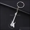 Keychains Creative Mini Musical Instrument Keychain Cute Sile Guitar Piano Saxophone Key Chain Ryggs￤ck Bilprydnad Musiksmycken DHPRF