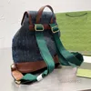 Bolsos escolares Bolso de diseñador Mochilas de mujer Mochila de cuero de lona Bolsos traseros de bandolera Bolso de moda Monedero Flor antigua Letras clásicas Detac