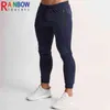 Calças masculinas RainbowTouches Autumn e Winter New Solid Color Sports Fitness Trouspers Training Running Men's Clothing Super Elastic Pants T220909