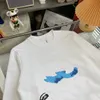 Tasarımcı Top Versiyon Hoodie El Yapımı Xiaoxiang 2022 Sonbahar ve Kış Yeni El Boyalı Logo Erkek ve Kadınların Aynı Yuvarlak Boyun Süvari