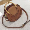 Borse da sera Rivetto rotondo 2022 Borse moda di marca da donna Borsa a tracolla in pelle PU Shopper femminile Designer Cluthes Crossbody per le donne