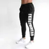 Men's Pants 2019 Autumn Gyms Joggers Skinny Sweat printing Tights Sweatpants For Men Side Zipper Sheer Trouser T220909