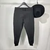 Pantaloni maschili di grandi dimensioni autunnali e invernali leggings allentati di Harlan personalizzati personalizzati semplici elastiche funzionali elastiche tute