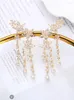 Pendientes colgantes XIUMEIYIZU Hermosa Mini Flor Borla Lujo Chapado en oro Zircon Jewelri Crystal Angel Ear Sweep Climber