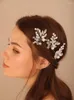 ヘッドピーストレンディな結婚式のヘアアクセサリー女性花嫁の花嫁介添人のブライダルヘッドピース手作りパーティーティアラヘッドドレス