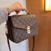 Embossed Flower Leather Crossbody Handbag