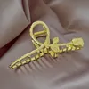 2022 New Design Sense Metal Rose Shape Back of Head Grab Clip Fashion Jewelry Hairpin 여성의 특이한 머리 장식 헤어 액세서리