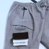 22SS Stone Spring Island Men Cotton Pants Basic Compass Badge broderad verktygsfickfickbyxor Sport Wear Casual3019