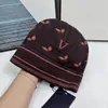 겨울 비니 클래식 편지 인쇄 니트 모자 여성 양모 모자 패션 유니에 렉스 따뜻한 두개골 모자